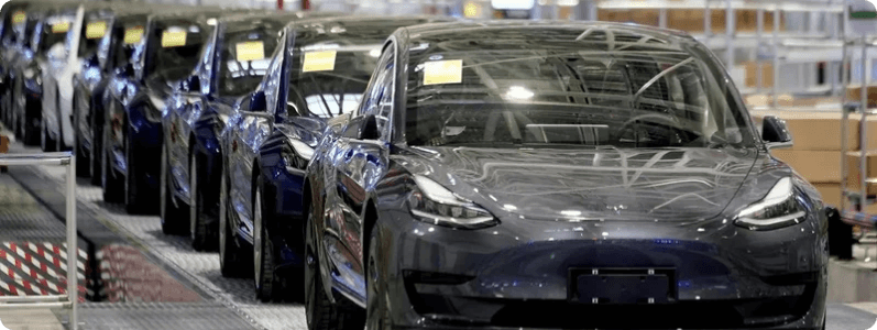 tesla machines line up