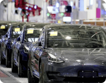 tesla machines line up