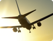 the plane is flying in the sky